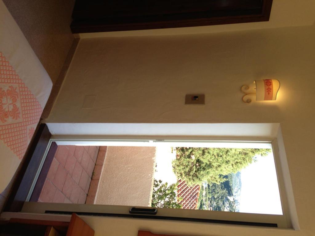 Hotel 3 Botti Baja Sardinya Oda fotoğraf